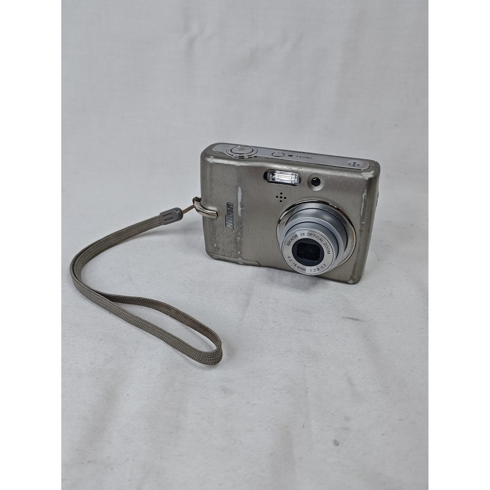 Nikon Coolpix L11 6.0MP Silver Digital Camera Nikkor 3x Zoom w/ 2GB SD Card
